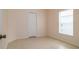 Bedroom shows a closet, window with blinds and neutral paint at 404 Central Mariners Dr, Edgewater, FL 32141