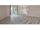 Spacious living area with sliding glass doors, providing ample natural light and seamless flow at 404 Central Mariners Dr, Edgewater, FL 32141