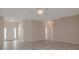 Bright and airy living room space, showcasing the home's open floor plan and natural light at 404 Central Mariners Dr, Edgewater, FL 32141