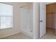 Bright bathroom with a white shower and a window with blinds at 404 Central Mariners Dr, Edgewater, FL 32141