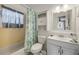 Clean bathroom with a shower and tub combination, a new vanity, and a linen closet at 412 Banana Cay Dr # A, South Daytona, FL 32119