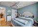 Comfortable bedroom with a ceiling fan, a neutral color scheme, and lots of storage at 412 Banana Cay Dr # A, South Daytona, FL 32119