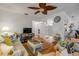 Inviting living room with hardwood floors, neutral walls, and open layout to the rest of the home at 412 Banana Cay Dr # A, South Daytona, FL 32119