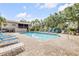 Community pool featuring lounge chairs and ample space for residents to enjoy at 412 Banana Cay Dr # A, South Daytona, FL 32119