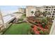 Resort community features lush gardens, pool, and ocean views at 4175 S Atlantic Ave # 4050, New Smyrna Beach, FL 32169