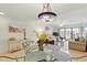 Open dining area next to living room and sofa at 4175 S Atlantic Ave # 4050, New Smyrna Beach, FL 32169