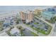 Aerial view showcases the beachfront condo with convenient parking, close proximity to the beach and ocean views at 421 S Atlantic Ave # 507, New Smyrna Beach, FL 32169