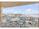 Balcony offers views of the beach and ocean, creating a relaxing and scenic outdoor space for residents at 421 S Atlantic Ave # 507, New Smyrna Beach, FL 32169