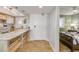 An open kitchen with granite countertops and a bedroom view give this condo an open feel at 421 S Atlantic Ave # 507, New Smyrna Beach, FL 32169