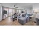 Living room with sliding glass doors lead to a balcony, offering panoramic ocean views at 421 S Atlantic Ave # 507, New Smyrna Beach, FL 32169