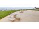 Outdoor picnic area with concrete tables and benches overlooking the beach at 421 S Atlantic Ave # 507, New Smyrna Beach, FL 32169