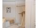 Bright bathroom with tub, shower and tiled floor offering comfort and convenience at 426 Bouchelle Dr # 401, New Smyrna Beach, FL 32169