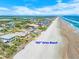 Stunning aerial shot of the oceanfront home on a drive-free beach, close to the city at 4323 S Atlantic Ave, Port Orange, FL 32127
