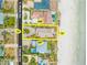 Aerial view of the property outlined in yellow and proximity to the beach at 4323 S Atlantic Ave, Port Orange, FL 32127