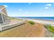 Relax on your private deck with direct beach access to pristine sandy shores at 4323 S Atlantic Ave, Port Orange, FL 32127