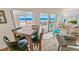 Bright dining area featuring a high-top table set with ocean views and comfortable seating at 4323 S Atlantic Ave, Port Orange, FL 32127