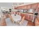 An open-concept space with a dining area, tile floors, and an ocean view at 4323 S Atlantic Ave, Port Orange, FL 32127