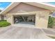 Attached two-car garage with shelves and storage at 4323 S Atlantic Ave, Port Orange, FL 32127
