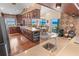 Gourmet kitchen and dining area boasts dark wood cabinetry and stunning ocean views at 4323 S Atlantic Ave, Port Orange, FL 32127
