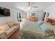 The main bedroom offers a seating area and balcony access with ocean views at 4323 S Atlantic Ave, Port Orange, FL 32127