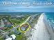 Aerial view of Harbour Village Beach Club with ocean views and surrounding homes at 4670 Links Village Dr # D206, Ponce Inlet, FL 32127