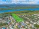 Timucuan Oaks Garden Park with river access, showcasing green space and waterfront features with surrounding residential area at 4670 Links Village Dr # D206, Ponce Inlet, FL 32127