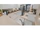Well-equipped kitchen showcasing counter space, white cabinetry, and stainless steel appliances at 4670 Links Village Dr # D206, Ponce Inlet, FL 32127