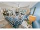 This living room features modern coastal furnishings with an open view of the Primary bedroom at 4670 Links Village Dr # D206, Ponce Inlet, FL 32127
