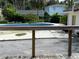 Backyard featuring an in-ground pool surrounded by mature trees at 5018 Riverside Dr, Port Orange, FL 32127