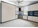 Versatile bedroom with built-in cabinets and desk, offering ample storage and workspace at 567 Mount Olympus Blvd, New Smyrna Beach, FL 32168