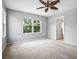 Bedroom featuring neutral walls, carpet, and natural light at 567 Mount Olympus Blvd, New Smyrna Beach, FL 32168