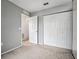 Bedroom featuring neutral colors and a large closet at 567 Mount Olympus Blvd, New Smyrna Beach, FL 32168