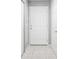 Inviting entryway features tile flooring and a white front door at 567 Mount Olympus Blvd, New Smyrna Beach, FL 32168