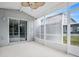 Screened porch providing outdoor living space at 567 Mount Olympus Blvd, New Smyrna Beach, FL 32168