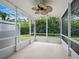 Screened porch overlooking the lawn at 567 Mount Olympus Blvd, New Smyrna Beach, FL 32168