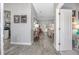 Inviting entryway featuring stylish tile flooring, neutral paint, and an open view into the living area at 6088 Sabal Hammock Cir, Port Orange, FL 32128