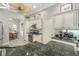 Bright kitchen with granite countertops, modern appliances, and convenient access to dining area, perfect for entertaining at 6088 Sabal Hammock Cir, Port Orange, FL 32128