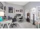Home office showcasing multiple workstations, natural light, and neutral décor at 6088 Sabal Hammock Cir, Port Orange, FL 32128
