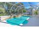 Screened in pool and spa surrounded by white tile patio at 6088 Sabal Hammock Cir, Port Orange, FL 32128