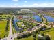 Stunning aerial shot of a community surrounded by lakes, showcasing the prime location at 637 Marisol Dr, New Smyrna Beach, FL 32168