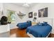 Charming bedroom featuring nautical decor, two twin beds, and wood flooring at 637 Marisol Dr, New Smyrna Beach, FL 32168