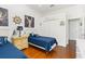 Nautical themed bedroom featuring two twin beds, closet, and wood flooring at 637 Marisol Dr, New Smyrna Beach, FL 32168
