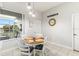 Eat-in dining area with natural light, stylish decor, and tiled floors at 637 Marisol Dr, New Smyrna Beach, FL 32168