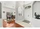 Spacious foyer with tile floors, leading to a dining area with elegant lighting at 637 Marisol Dr, New Smyrna Beach, FL 32168