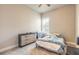Cozy bedroom with plush carpeting, ample natural light, and neutral walls for a relaxing retreat at 6456 Roseberry Ct, Port Orange, FL 32128