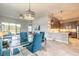 Modern kitchen and dining area with stainless steel appliances and plenty of natural light at 6456 Roseberry Ct, Port Orange, FL 32128