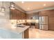 Modern kitchen featuring stainless steel appliances, custom cabinets, and stylish countertops at 6456 Roseberry Ct, Port Orange, FL 32128
