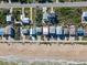 Aerial view of a beachfront property with private beach access at 6530 S Atlantic Ave, New Smyrna Beach, FL 32169