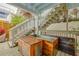 Outdoor hot tubs on a wooden deck with stairs, providing a relaxing spa experience at 6530 S Atlantic Ave, New Smyrna Beach, FL 32169