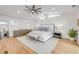 Airy bedroom with hardwood floors, recessed lights, and stylish modern decor at 6530 S Atlantic Ave, New Smyrna Beach, FL 32169